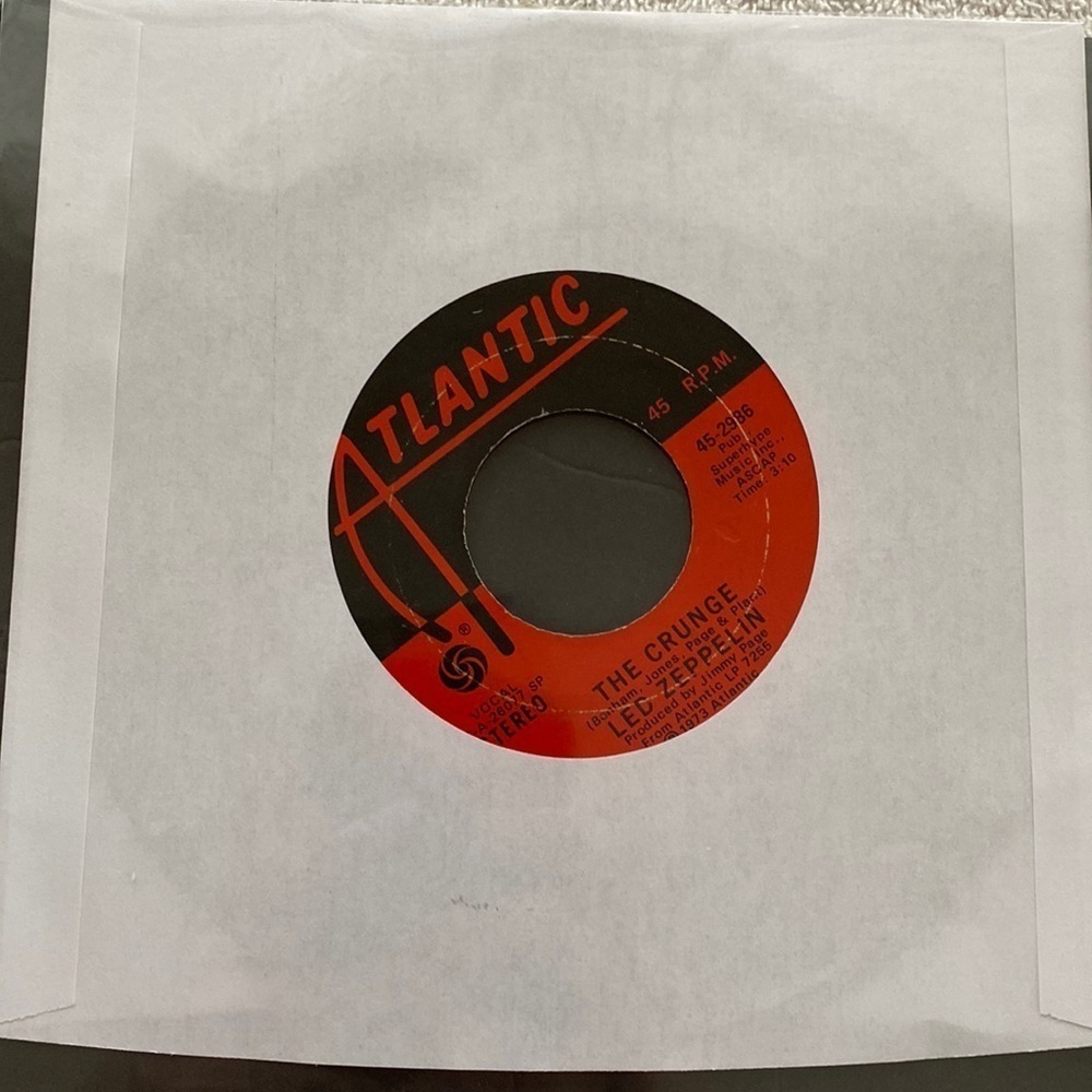 Vintage 45 vinyl record Led Zeppelin The Crunge has converter for playing